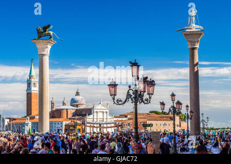 Columns in the Piazzetta, with the Island of San Giorgio Maggiore behind, Venice, Veneto region, Italy. Stock Photo