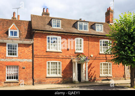 Typical red brick Georgian style town house in High Street, Hungerford, Berkshire Stock Photo