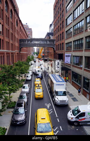 New York City street traffic beneath the (NABISCO) National Biscuit Company Building Bridge from the High Line, NYC USA Stock Photo