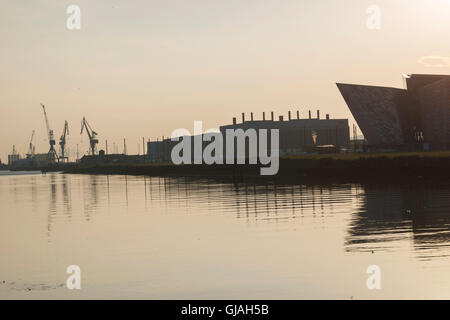 The Titanic building along side the famous Harland and Wolff cranes in the Titanic Quarter, Belfast Stock Photo