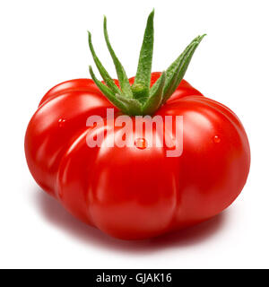 Ripe Heirloom Tomato (Togorific) with sepal. Clipping paths, shadow separated, infinite depth of field Stock Photo