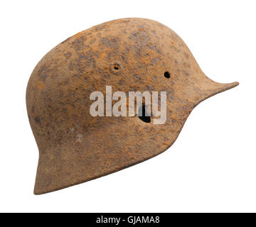 A rusty German World War Two (Stahlhelm M1940) military helmet. Stock Photo