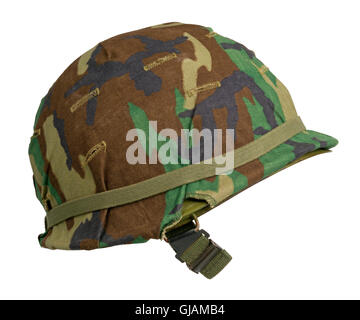 A US military helmet with an M81 Woodland pattern camouflage cover. Stock Photo