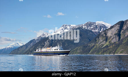 Alaskan Marine System ferry in the Lynn Canal near Haines in summer. Stock Photo