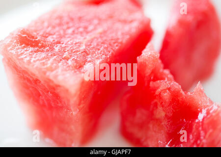 Slice of watermelon on white plate, close up photo Stock Photo