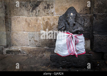 Stone statue of Ganesha /Vighneswara in the ancient Gangaikonda Cholapuram temple, Tamil Nadu, India Stock Photo