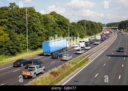 Slow Traffic affected by road works at Junction 8 on the M6 Motorway at Chorley, Lancashire, UK Stock Photo