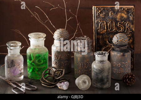 witch apothecary jars magic potions halloween decoration Stock Photo