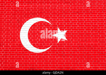 Flag of Turkey on brick wall texture background. Turkish national flag. Stock Photo