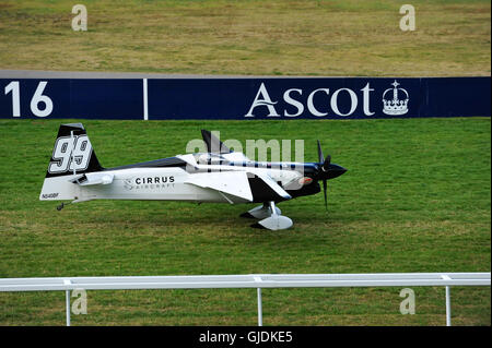 Mike Goulian (USA) about to take off during the final races in the Red Bull Air Race, Ascot, United Kingdom.  The Red Bull Air Race features the world’s best race pilots in a pure motorsport competition that combines speed, precision and skill. Using the fastest, most agile, lightweight racing planes, pilots hit speeds of 370kmh while enduring forces of up to 10G as they navigate a low-level slalom track marked by 25-meter-high, air-filled pylons.  The final race winners were Matt Hall (AUS) who took gold, Matthias Dolderer (GER) who took silver and Hannes Arch (AUT) who took bronze. Stock Photo