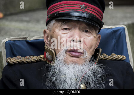 Tokyo, Tokyo, Japan. 15th Aug, 2016. A man wearing a WW2 militar uniform at Yasukuni Shrine on the 71st anniversary of Japan's surrender in World War II, Yasukuni enshrines the war dead including war criminals and as such visits by Japanese politicians tend to provoke anger from neighbors China and Korea that suffered from Japan's militarist past. Credit:  Alessandro Di Ciommo/ZUMA Wire/Alamy Live News Stock Photo