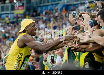 Rio De Janeiro, Brazil. 15th Aug, 2016. Sprinter Usain Bolt of Jamaica celebrates his victory in athletics 100 m run men at the 2016 Summer Olympics in Rio de Janeiro, Brazil, August 14, 2016. © Vit Simanek/CTK Photo/Alamy Live News Stock Photo