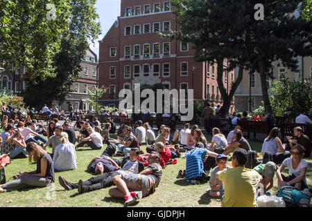London, UK. 15th Aug, 2016. People enjoy the sunshine in Soho Square London as temperatures are expected to rise over the next days and forecasters predict many parts of the United Kingdom  will be sweltering in hot temperatures Credit:  amer ghazzal/Alamy Live News Stock Photo