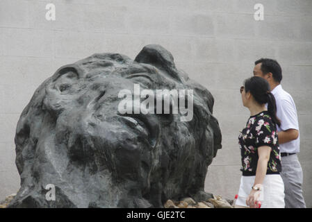 Nanjing, Nanjing, China. 16th Aug, 2016. Nanjing, CHINA - August 6 2016: (EDITORIAL USE ONLY. CHINA OUT) Visitors look at the files and ironclads of Japanese invaders' cruel massacre at Nanjing Massacre VictimsÂ¡Â¯ Memorial Hall. Tomomi Inada, who was appointed as Japanese defense minister, denied the existence of killing competition during the Nanjing Massacre that left an estimated 300,000 people dead in interviews with local media on August 4, 2016. China recently slammed the new Japanese ministerÂ¡Â¯s fault of denying the history and said that Japan should face up to the fact. (Credit I Stock Photo