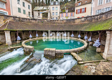 La fosse Dionne - the karst spring located in the center of Tonnerre, France Stock Photo