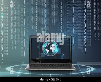 laptop computer with earth globe on screen Stock Photo