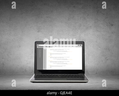 laptop computer with coding on screen Stock Photo