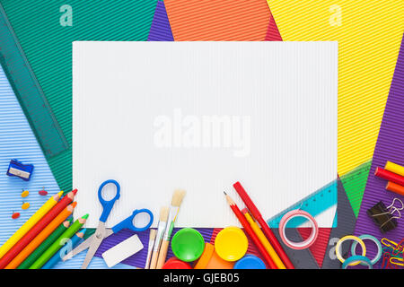 Back to school. Colorful composition of school supplies and blank sheet of paper. Flat lay. Stock Photo