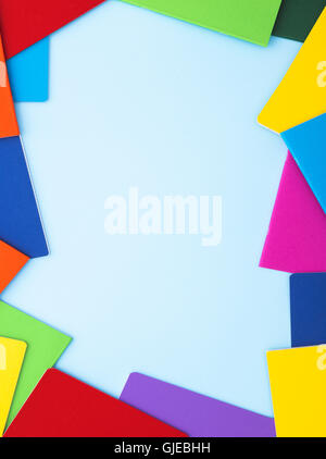 Back to school background with blank notebooks on bright blue ...