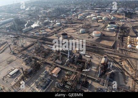 El Segundo, California, USA - August 6, 2016:  Afternoon aerial view of large steaming oil refinery near the Pacific Coast in So Stock Photo