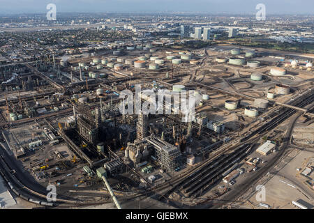 El Segundo, California, USA - August 6, 2016:  Aerial view of large steaming oil refinery near Los Angeles. Stock Photo