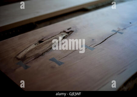 Custom wood table top awaiting stain and assembly Stock Photo - Alamy