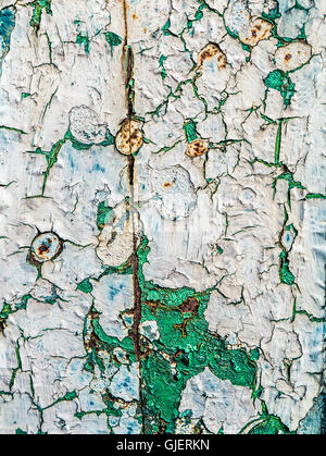 Texture Of Cracked White Paint Peeling From Wall Stock Photo
