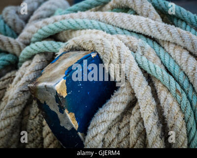 Bunch of different coloured fishing ropes in a harbour Stock Photo