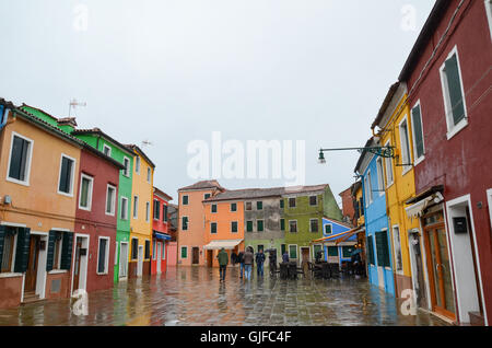 Colourful small houses on a rainy day in Burano island, Venice, Italy. March 3, 2016 Stock Photo