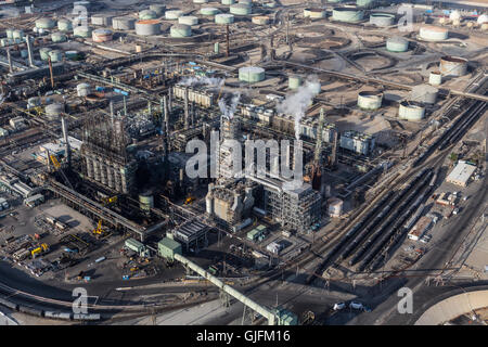 El Segundo, California, USA - August 6, 2016:  Afternoon aerial view of steaming oil refinery near Los Angeles in Southern Calif Stock Photo