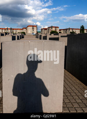 A Man's shadow on The Holocaust Memorial  to the murdered Jews of Europe, Berlin, Germany. Stock Photo