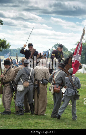 Confederate Soldiers on the battlefield of a American Civil war reenactment at Spetchley Park, Worcestershire, England Stock Photo