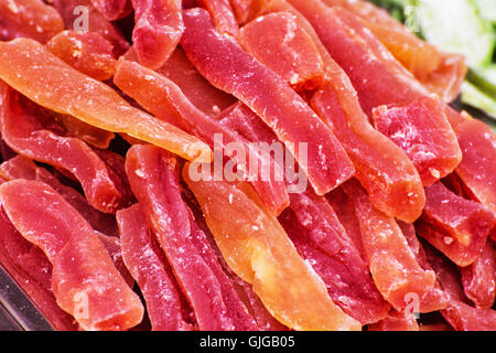 Dried sliced oranges and grapefruits on the market place. Citrus fruits. Healthy food theme. Stock Photo