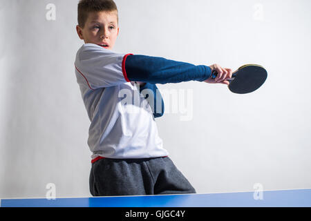 little boy playing table tennis Stock Photo