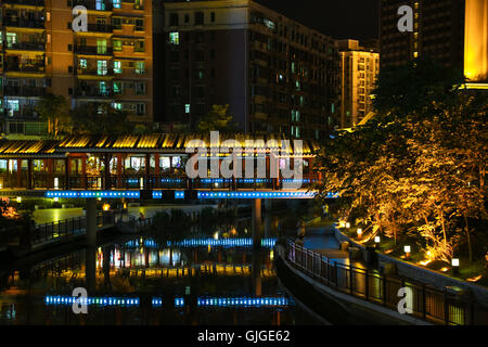 Night scenery of Jinshan river recreation park at the heart of the city Huizhou, guangdong, China. Stock Photo