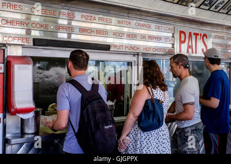 A queue Philly Cheese-Steak sandwich's at Pat's king of steaks at South 9th Street Italian Market Philadelphia Stock Photo