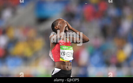 Rio De Janeiro, Brazil. 16th Aug, 2016. Kenya's Faith Chepngetich Kipyegon celebrates after crossing the finish line during the women's 1500m final of Athletics at the 2016 Rio Olympic Games in Rio de Janeiro, Brazil, on Aug. 16, 2016. Faith Chepngetich Kipyegon won the gold medal. Credit:  Lui Siu Wai/Xinhua/Alamy Live News Stock Photo