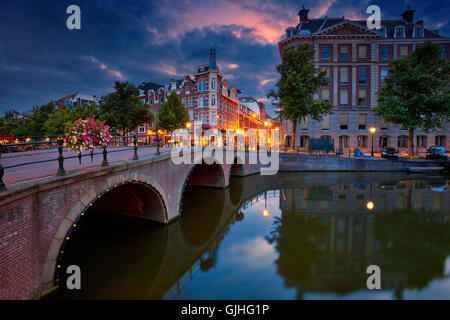 Amsterdam. Image of Amsterdam, Netherlands during dramatic sunrise. Stock Photo