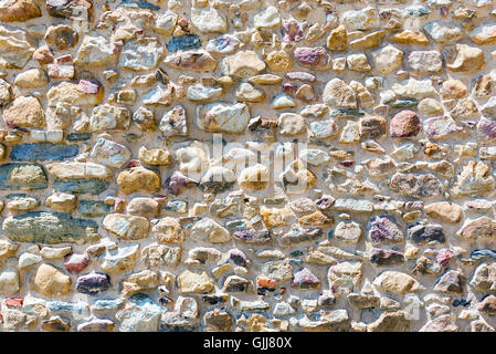 Background from an old natural stone wall Stock Photo