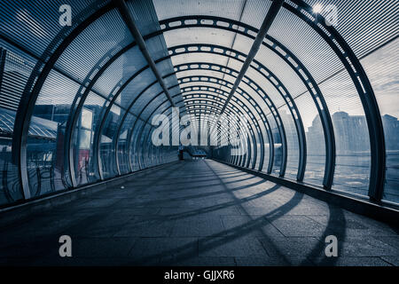 Poplar tunnel / walkway at DLR Docklands Light Railway station, London, United Kingdom Stock Photo