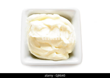 Mayonnaise or Sour Cream in a White Square Bowl Stock Photo