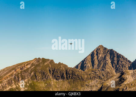 Drone flying over mountains at Hintertux Zillertal, Austria Stock Photo