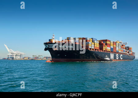 The Giant Mediterranean Shipping Company Container Ship, MSC Elodie, Steaming Towards The Long Beach Container Terminal, Los Angeles, California, USA. Stock Photo