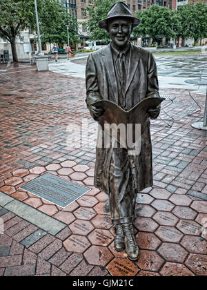 Statue of Songwriter Johnny Mercer in the Charming Elegant City of Savannah on the Savannah River in Georgia USA Stock Photo