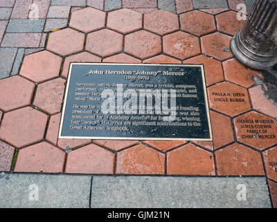 Statue of Songwriter Johnny Mercer in the Charming Elegant City of Savannah on the Savannah River in Georgia USA Stock Photo