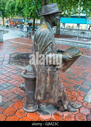 Statue of Songwriter Johnny Mercer in the Charming Elegant City of Savannah on the Savannah River in Georgia USA Stock Photo