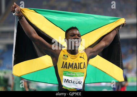 Jamaica's Omar McLeod celebrates after winning gold in the Men's 110m Hurdles Final at the Olympic Stadium on the eleventh day of the Rio Olympics Games, Brazil. Picture date: Tuesday August 16, 2016. Photo credit should read: Mike Egerton/PA Wire. EDITORIAL USE ONLY Stock Photo