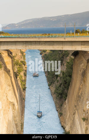 Boats travelling inside the isthmus of Corinth in Greece. Stock Photo