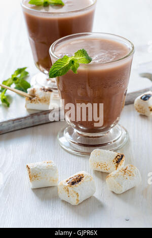 Homemade chocolate egg cream, beverage with milk, soda water and chocolate syrup with toasted marshmallows Stock Photo