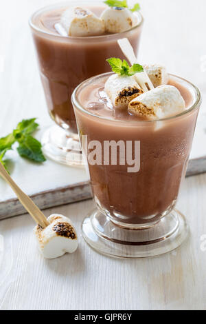Homemade chocolate egg cream, beverage with milk, soda water and chocolate syrup with toasted marshmallows Stock Photo